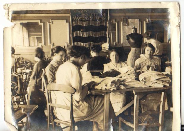 Work Room set up by the New Constitutional Society for Women's Suffrage - of which Kate was in charge. Note the NCS flag in the background - the only image of it that survives
